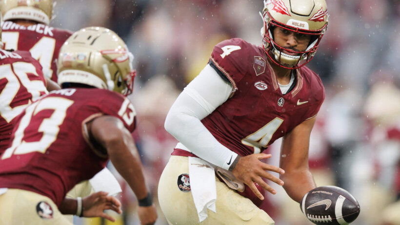 Florida State quarterback DJ Uiagalelei gets ready to hand the ball off