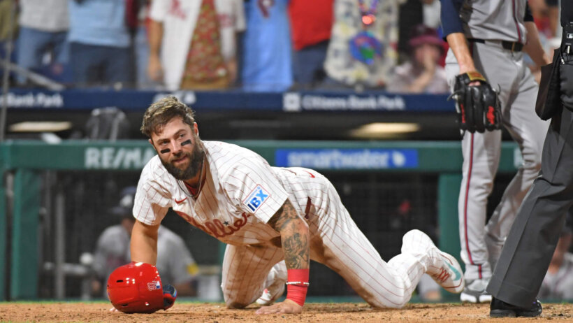Philadelphia Phillies outfielder Weston Wilson sliding into home