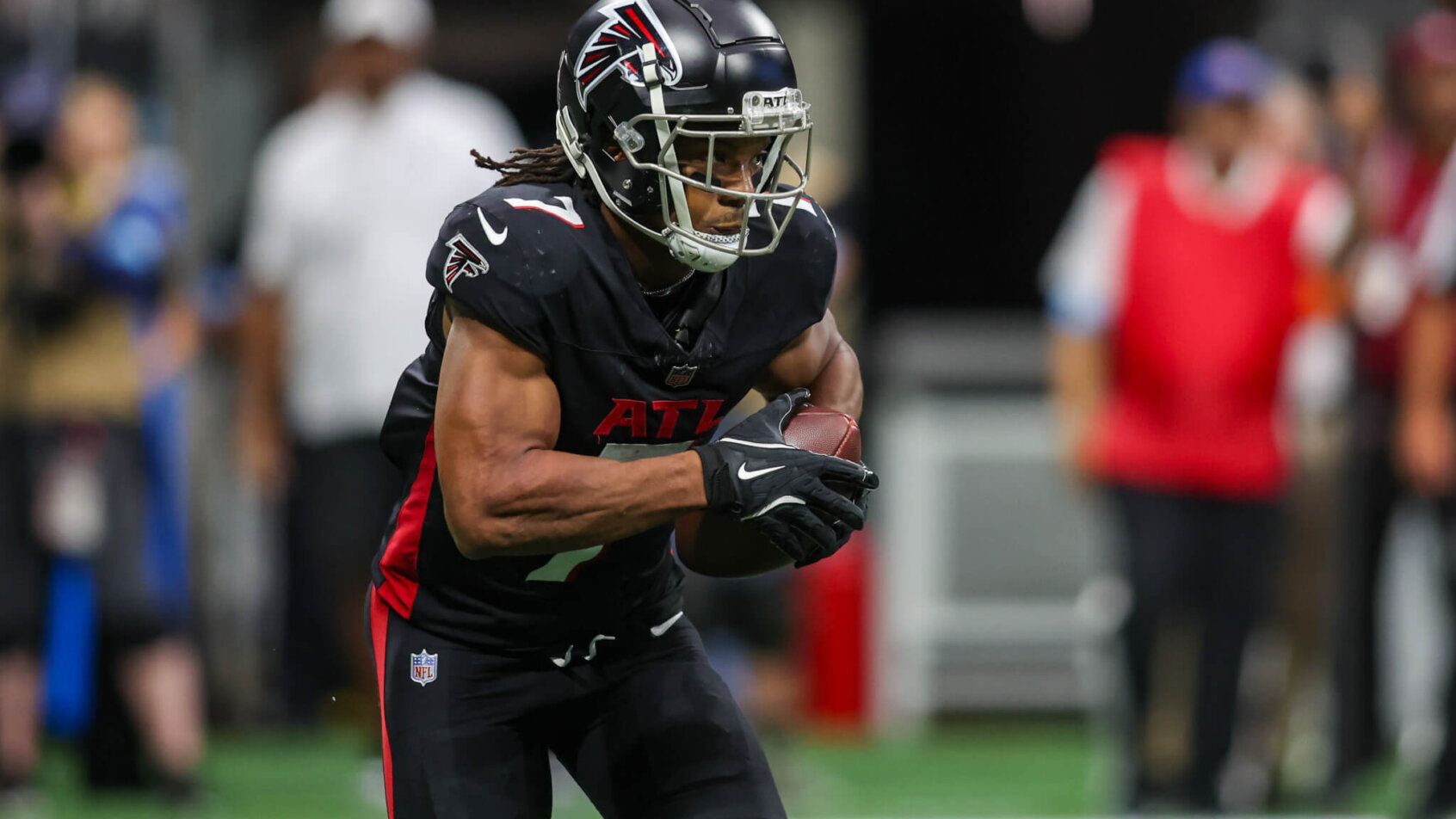 Atlanta Falcons running back Bijan Robinson carrying the ball