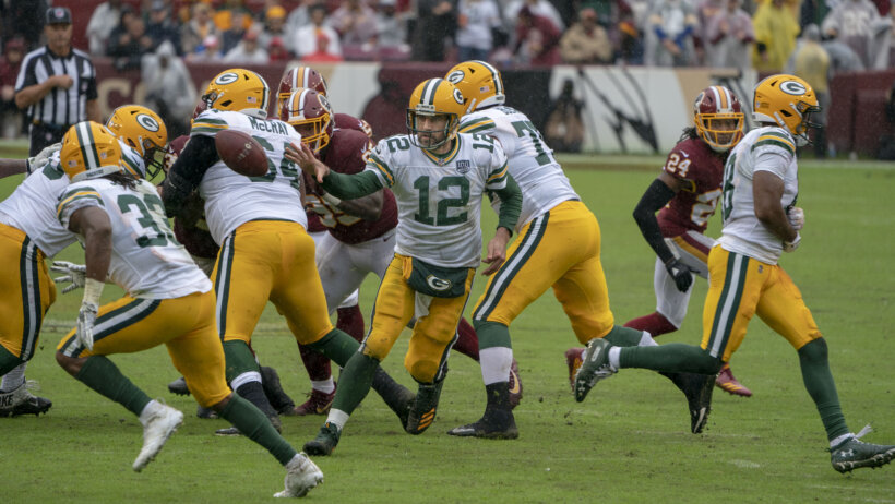 Aaron Rodgers with a handoff.