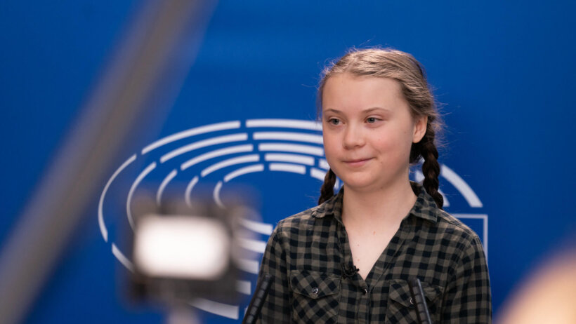 Greta Thunberg speaking at a forum.