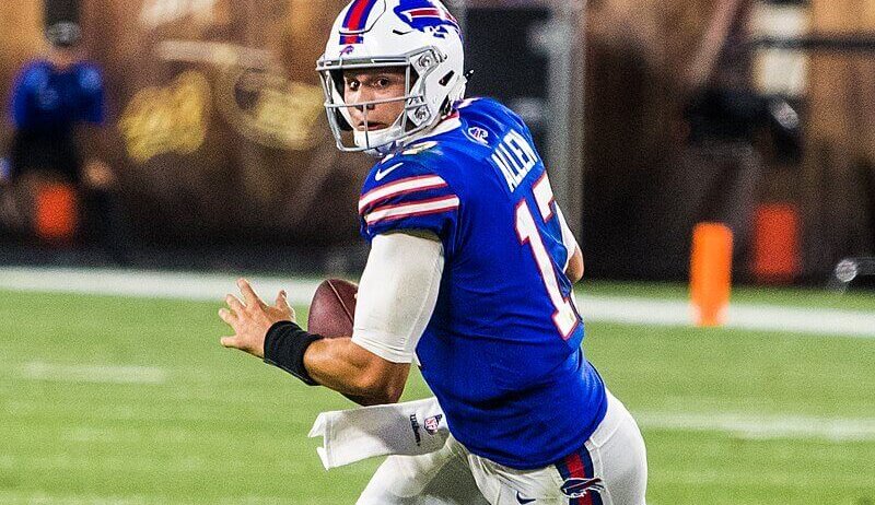 Josh Allen rolling out to pass
