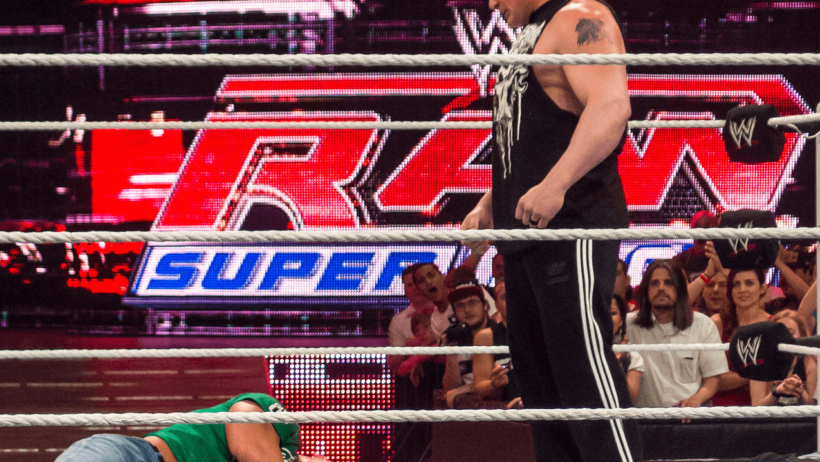 Brock Lesnar standing over John Cena back in 2012
