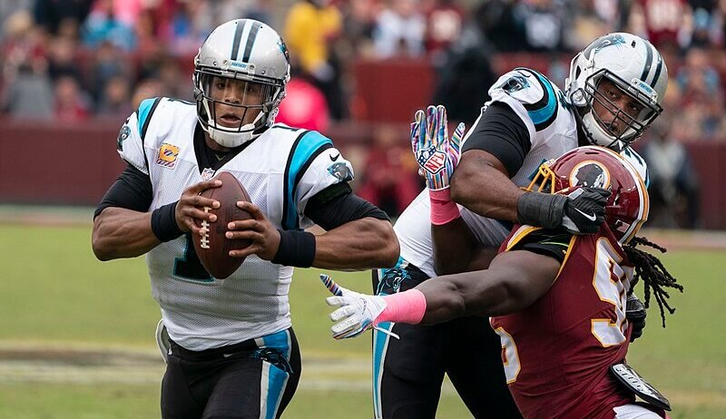 Cam Newton escaping the pocket