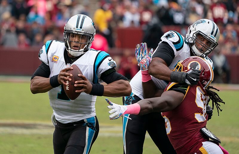 Cam Newton escaping the pocket