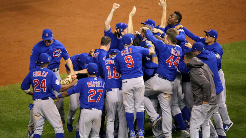 Chicago Cubs players celebrating on the mound