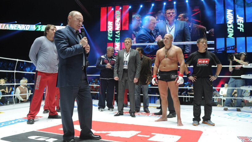 Fedor Emlianenko in the ring with Vladimir Putin after a fight