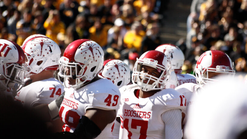 An Indiana football player looks on