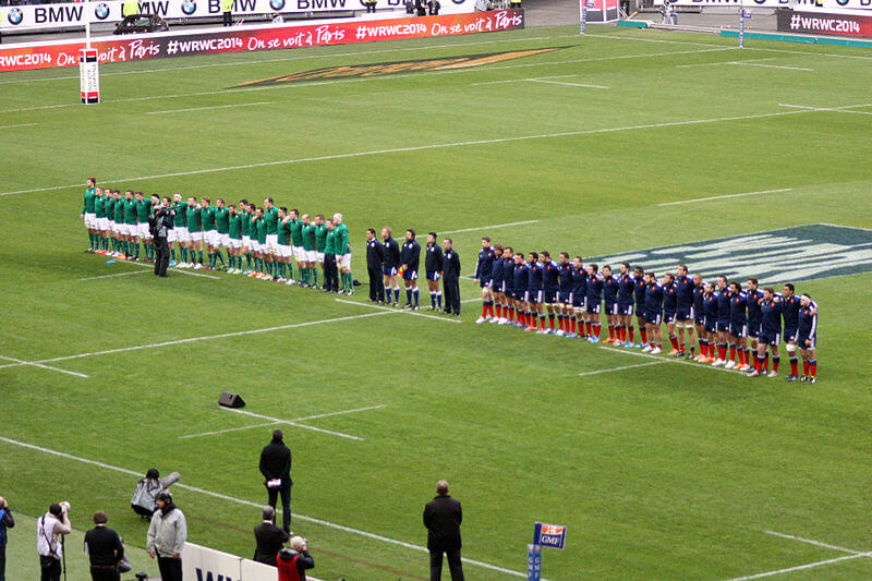 France and Ireland stand at attention for the national anthems