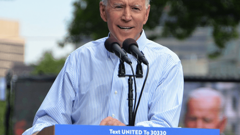 Joe Biden speaking at a podium