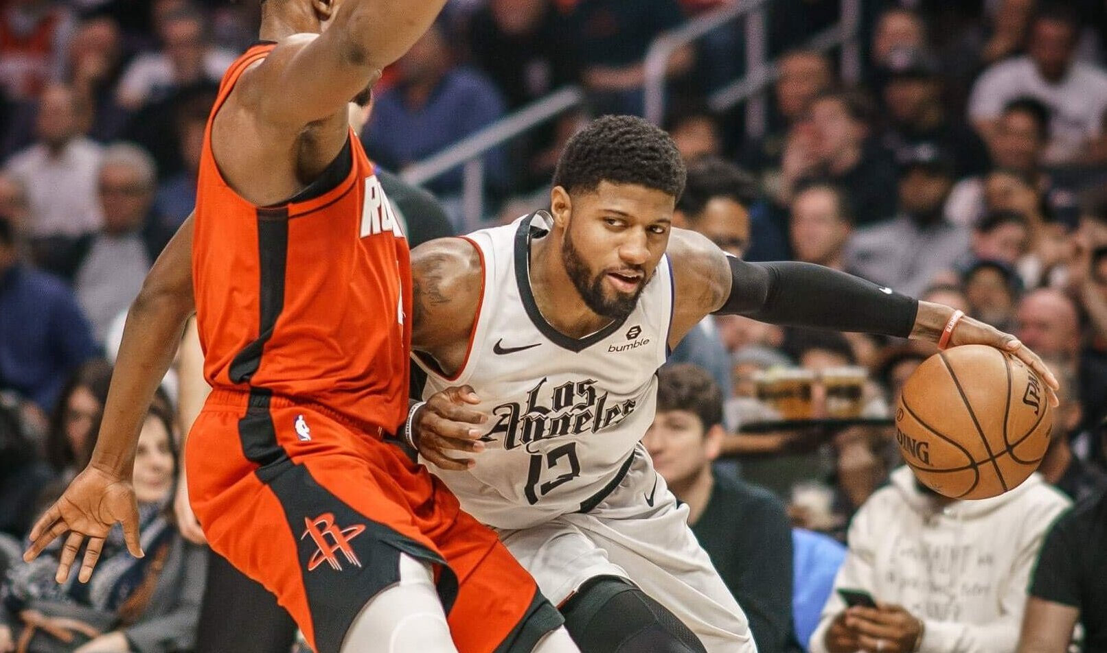 Paul George getting around defender