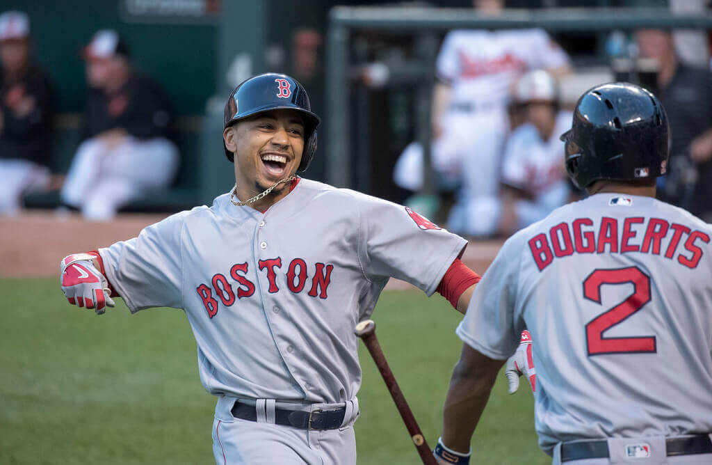 Mookie Betts celebrating at home plate