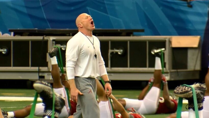 Alabama strength and conditioning coach Scott Cochran gets his team fired up at pratice