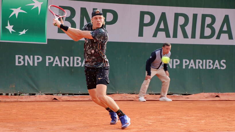 Denis Shapovalov gets ready to hit a forehand