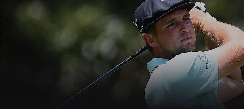 bryson dechambeau swing a golf club