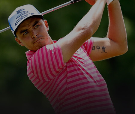rickie fowler swinging a golf club