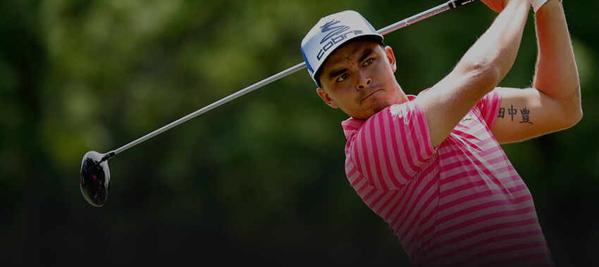 rickie fowler swinging a golf club