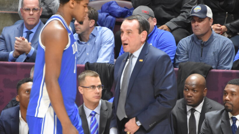 Vernon Carey JR & Coach K talking on the sideline