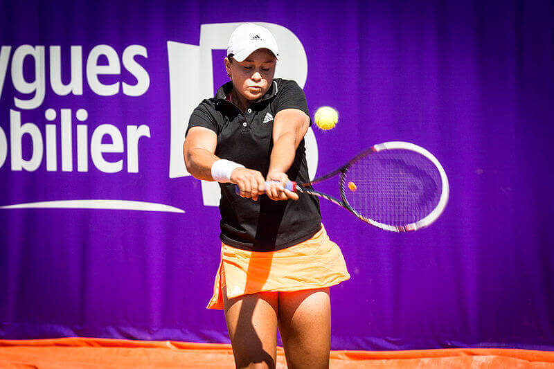 Ashleigh Barty hitting a return shot