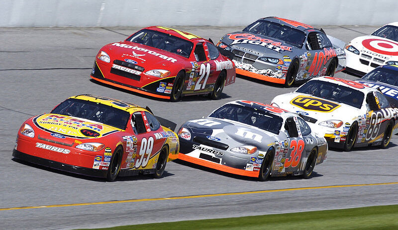 Drivers making the turn at Darlington.