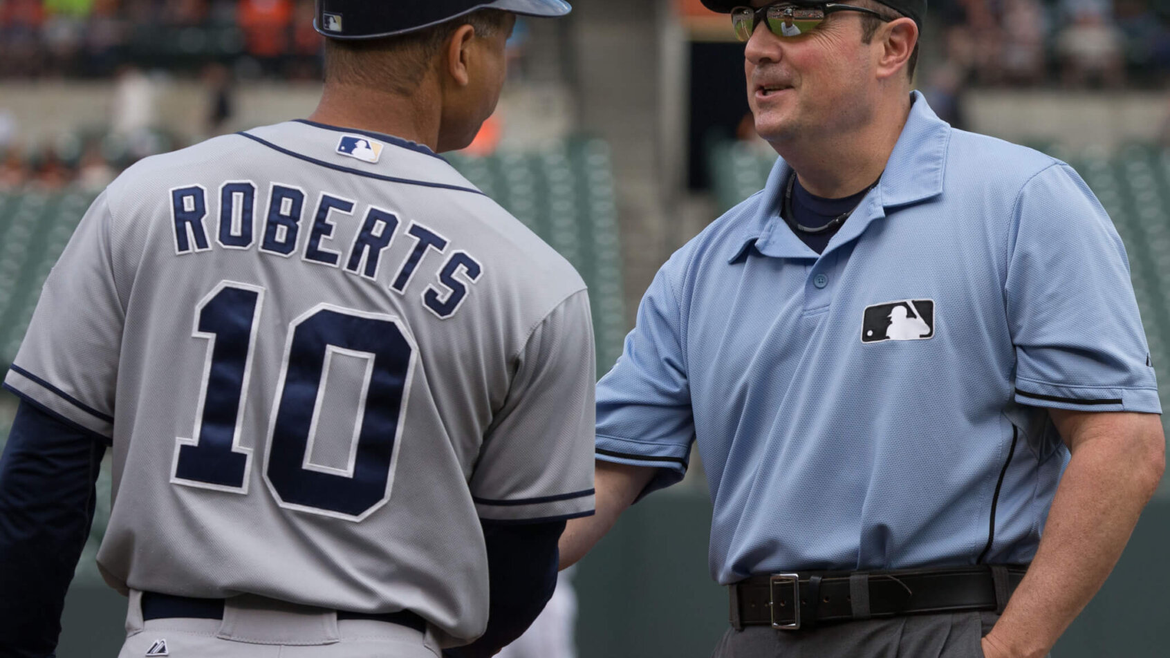 Dave Roberts speaking with an umpire