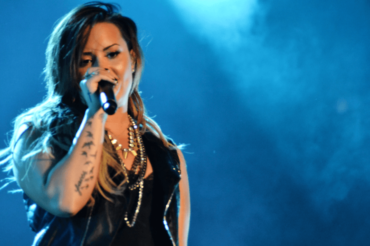 Demi Lovato performing a song.