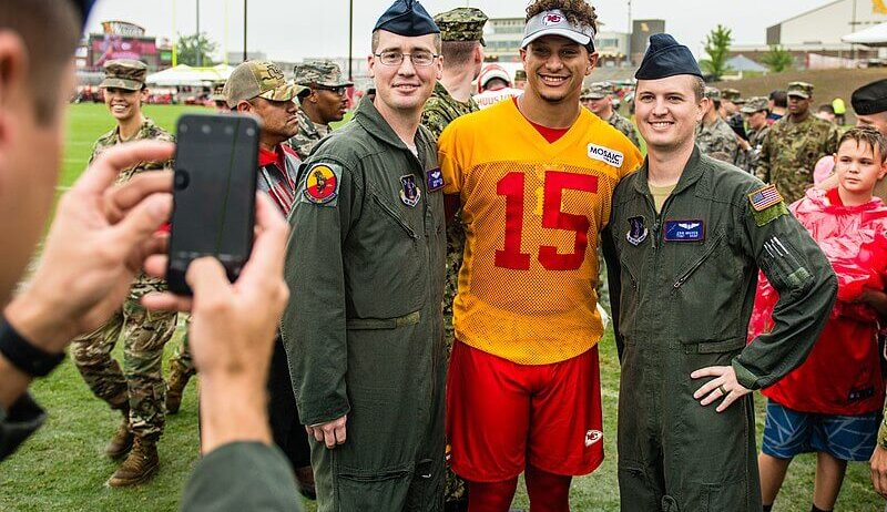 Patrick Mahomes poses for a photo.
