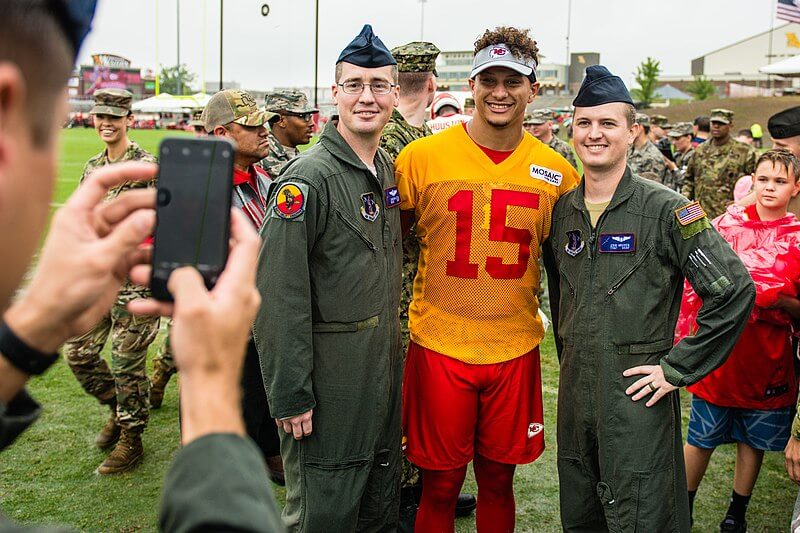 Patrick Mahomes poses for a photo.
