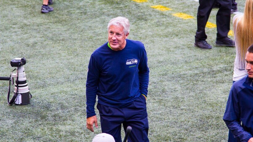 Pete Carroll walking the sidelines.