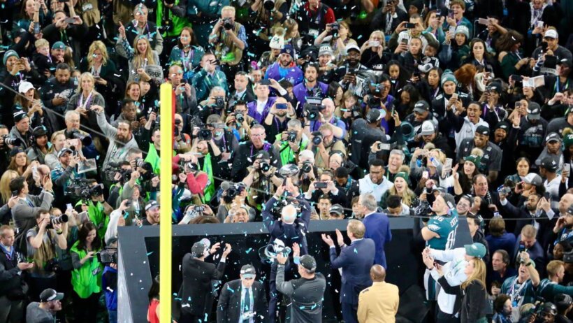 Super Bowl broadcast shows the crowd.