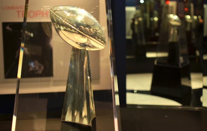 Super Bowl trophy in the case.
