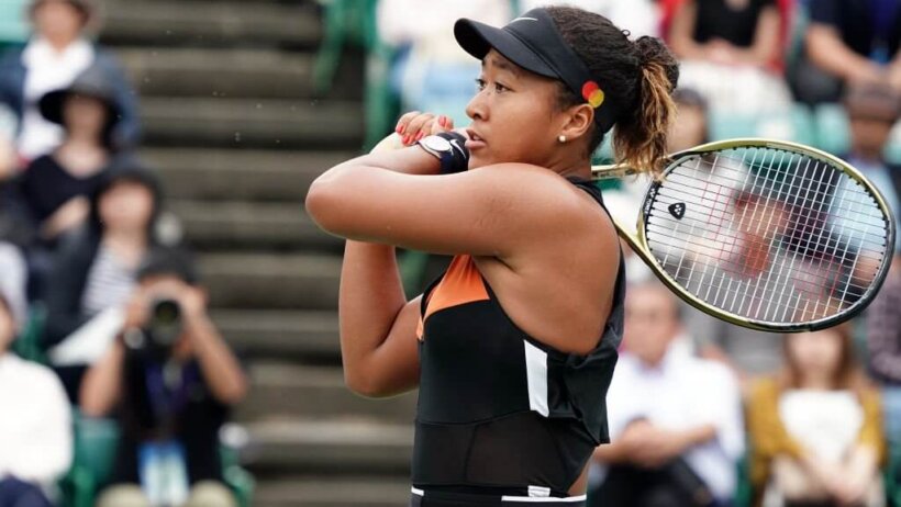 Naomi Osaka hitting a forehand.