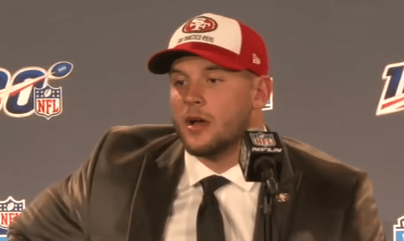 Nick Bosa answering questions at a press conference.