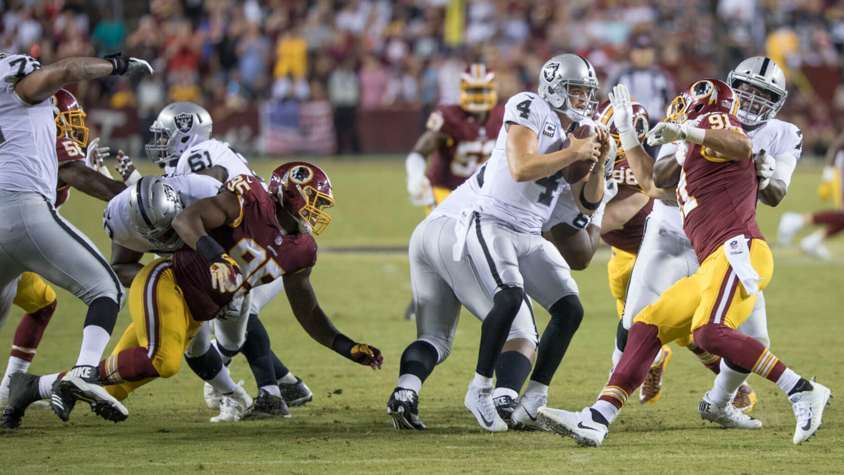 Oakland Raiders playing the Washington Redskins