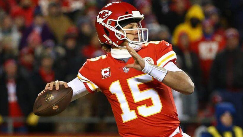 Patrick Mahomes about to pass.