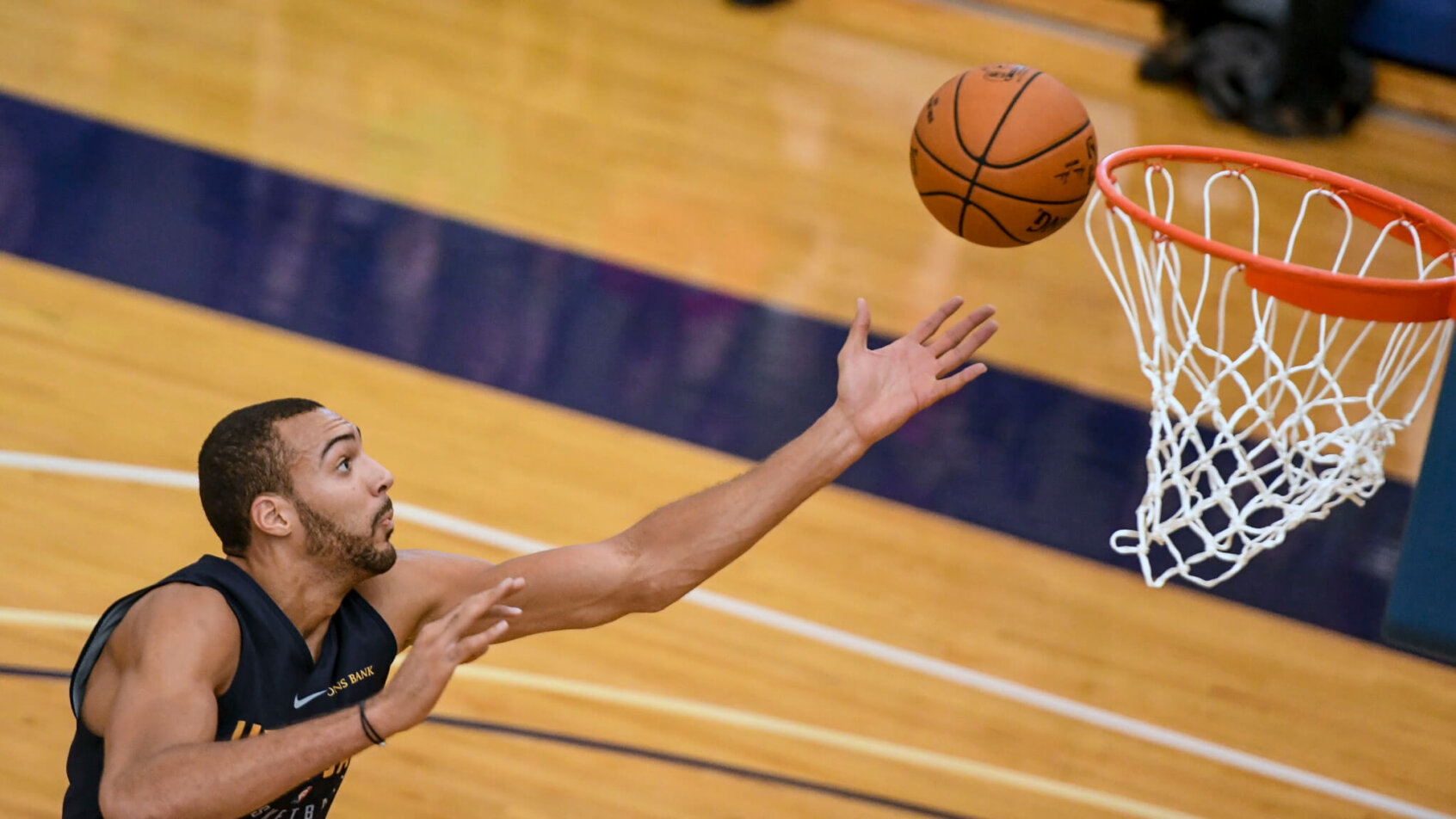 Rudy Gobert going in for a layup.