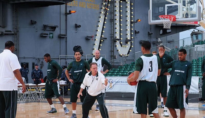 Tom Izzo coaching Michigan State on an aircraft carrier.