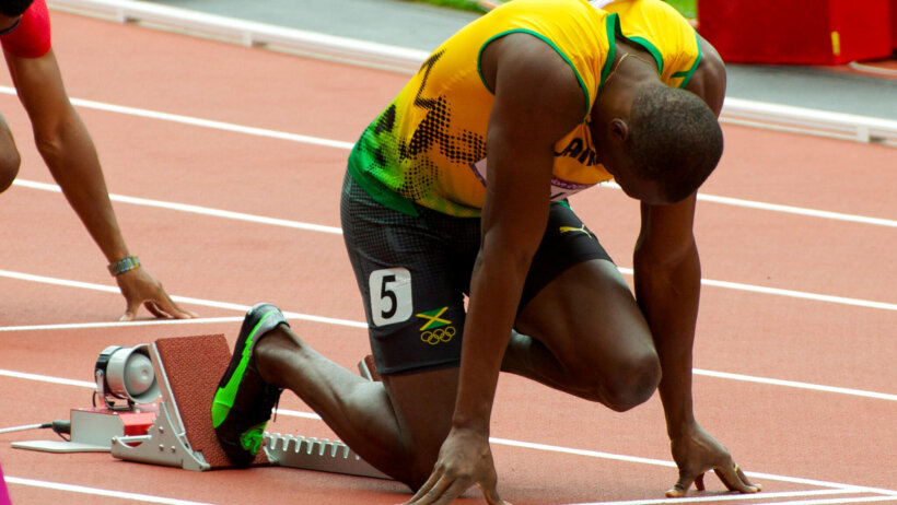 Usain Bolt on the starting blocks.