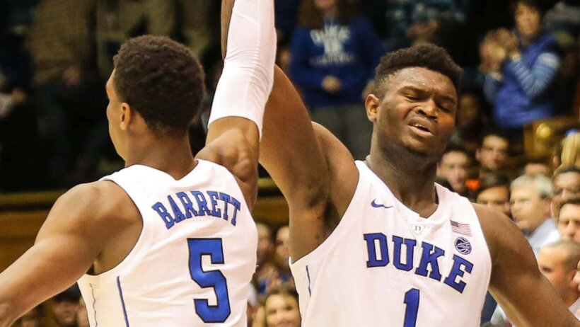 RJ Barrett and Zion Williamson high five